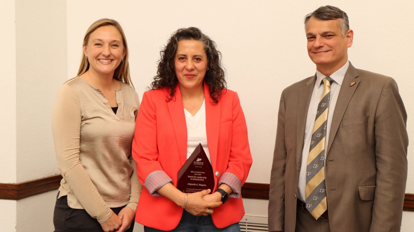 From left to right: Elizabeth Barajas, Alejandra Magana and Dean Castro. (Purdue University photo/John O'Malley)