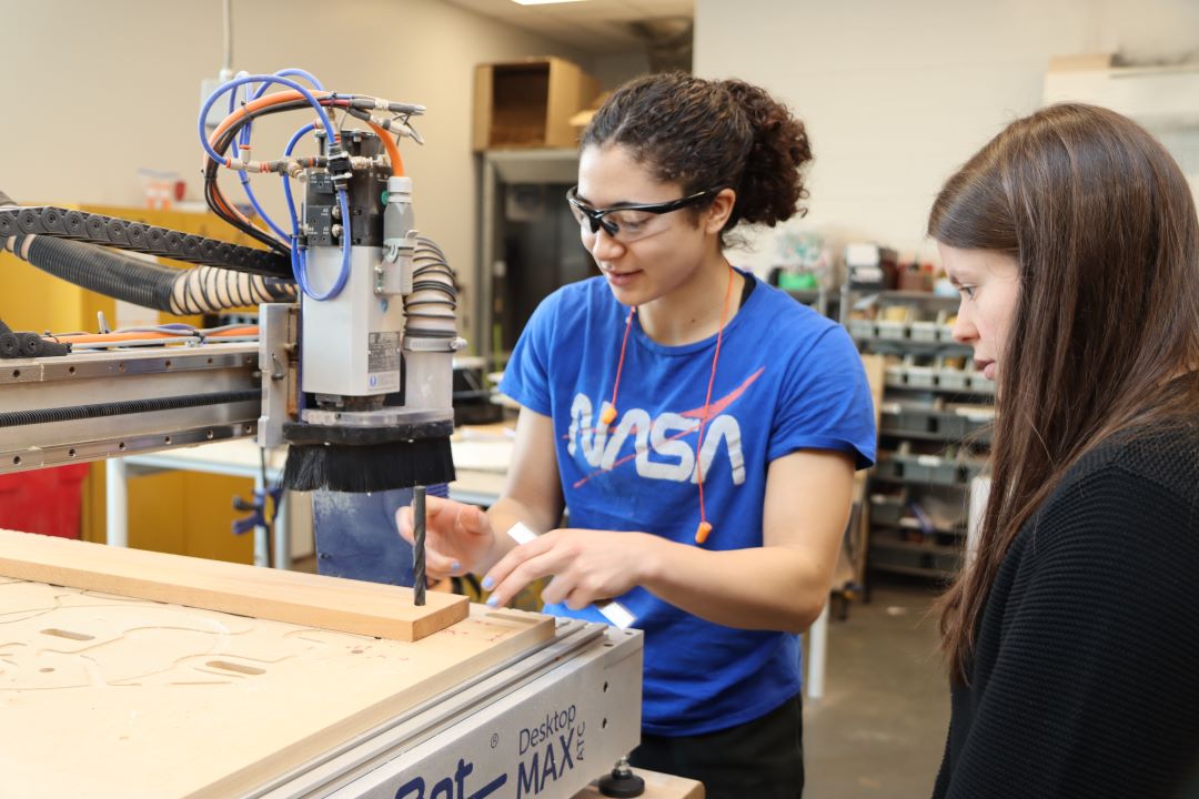 Students working in the Guitar Lab, with oversight by Mark French. (Purdue University photo/John O'Malley)