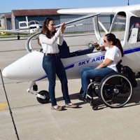 Purdue instructor Molly Van Scoy talks flight details with Able Flight student Melissa Allensworth prior to take-off.