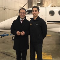 Hong Lei receives Purdue wings from Colin Gifford