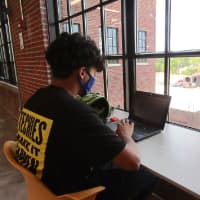 A Purdue Polytechnic High School Englewood student finds a quiet spot for study.