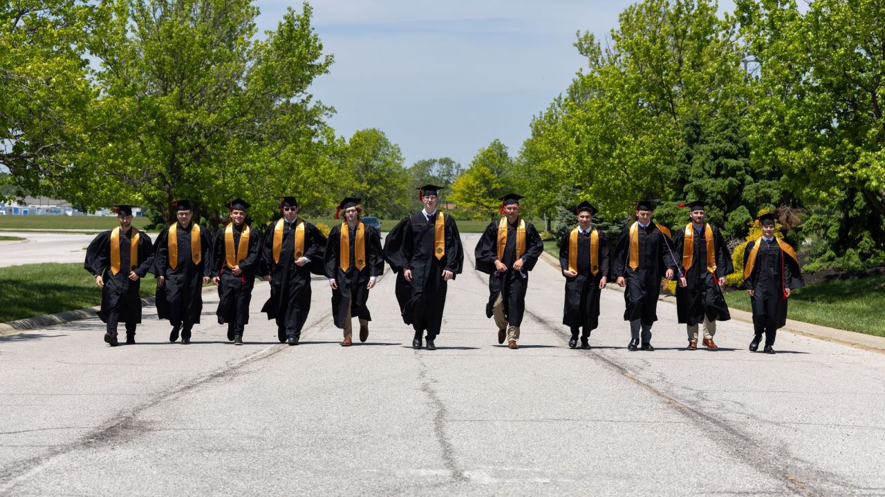 All graduates from the 2025 spring commencement at Indianapolis' Aviation Technology Center. (Photo credit: Black Rocket Photography)