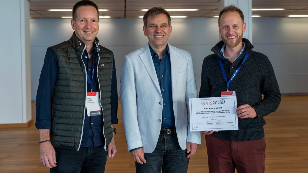 Parsons (right) and Shukla presented "a theoretical framing and qualitative study on how visualization design professionals co-evolve visualization problems and solutions" in their research. (Photo provided)