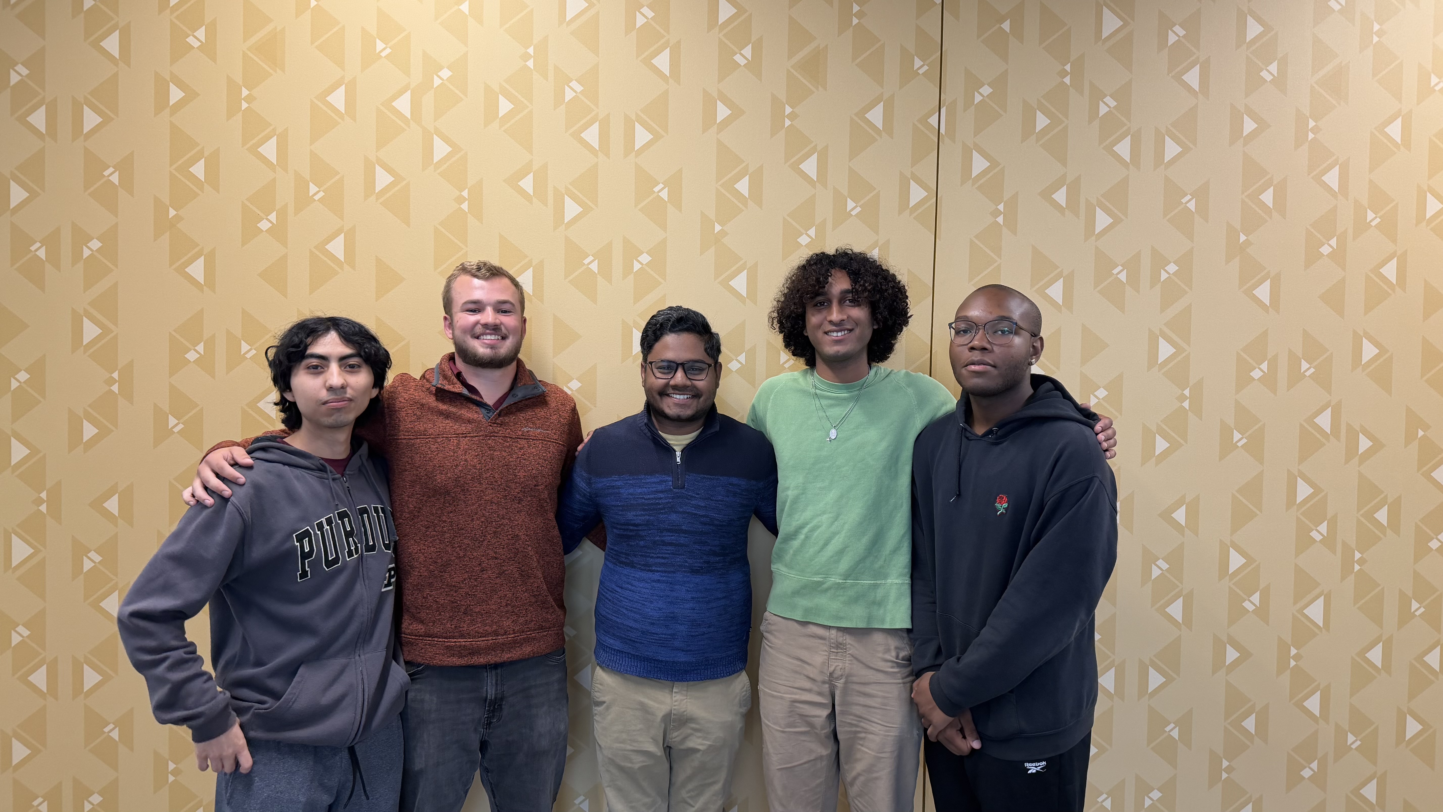An image of the team members. From left to right: Isaac Partida, Nathan Moyer, Ridwan Salam, Rio Wagabaza, and Damiyon Jones