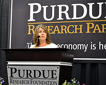 Carrie Berger, associate dean for research, speaks at the Indiana Manufacturing Institute ribbon cutting.