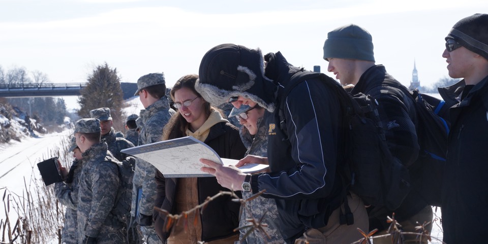 Students and cadets examine a terrain map at Gettysburg National Military Park