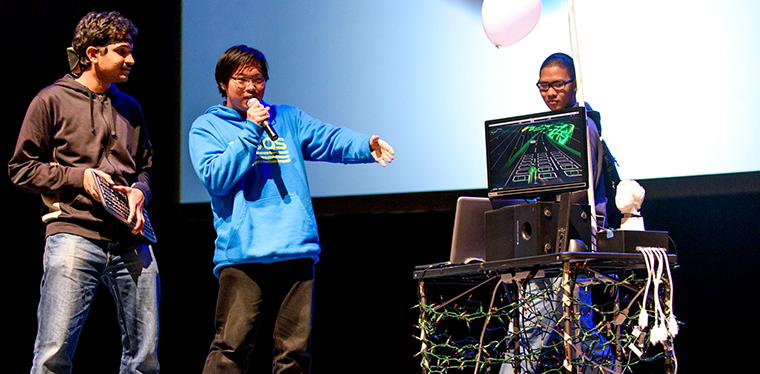 The student inventors present their Halloween Party Station at BoilerMake.