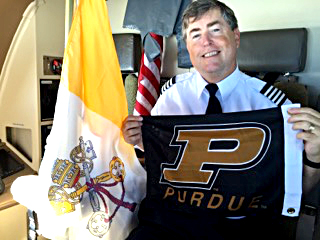 Tom Murray represents Purdue on the papal flight.