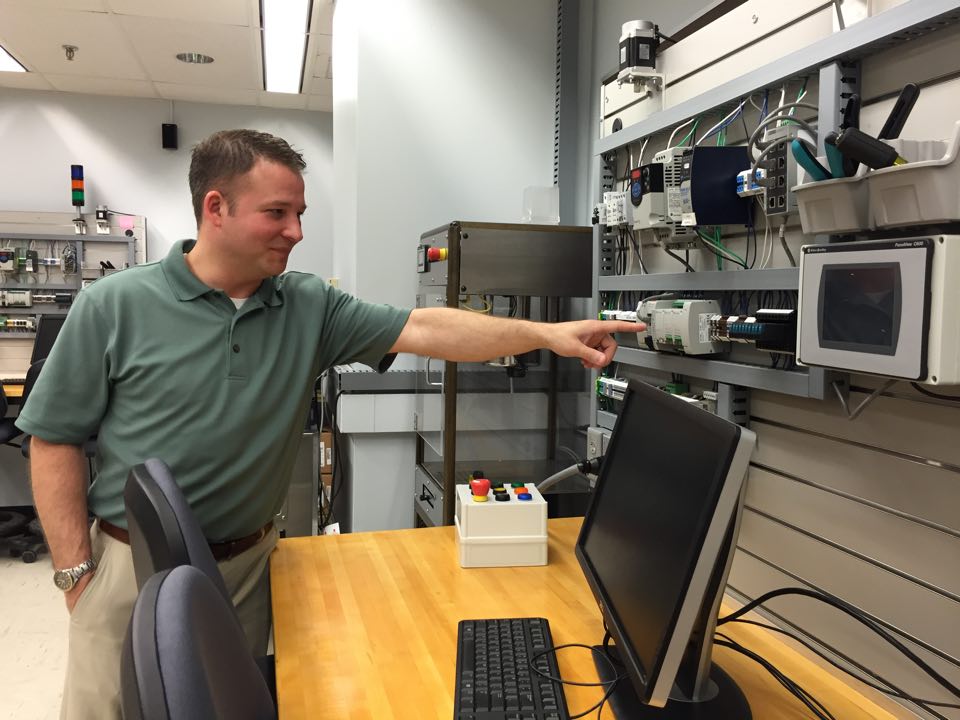 Grant Richards in the industrial controls lab, Knoy 102