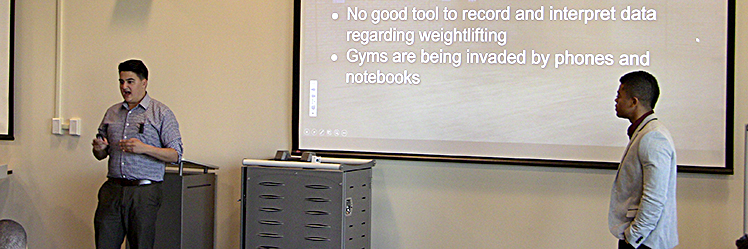 Daniel Golant (left) and Chris Price present Spotter to a panel of judges. Photo by Purdue Research Foundation.