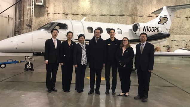 Hong Lei, consul general of the People's Republic of China in Chicago, and his staff at the Purdue airport