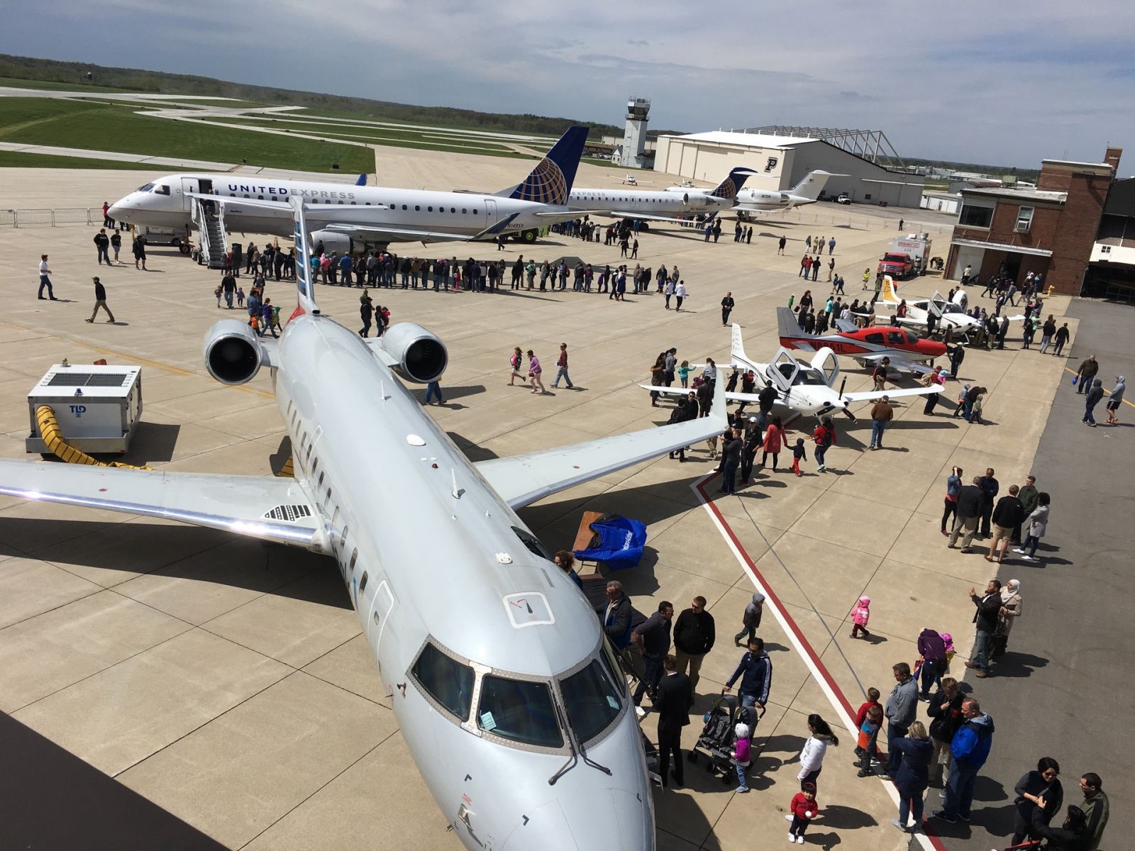 Visitors examine jet aircraft at the 2017 Purdue Aviation Day