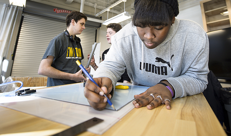 Students work in Purdue Polytechnic Institute’s pilot competency-based education program last year. 