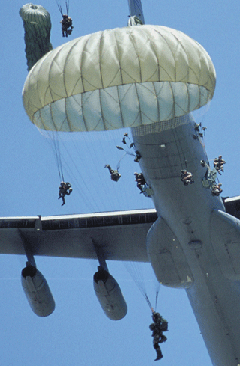 Army National Guard and Army Reserve jumping out of a plane