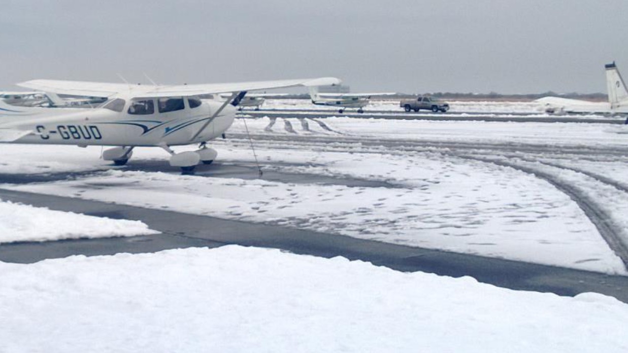 A student research team proposed adapting remote sensing technologies to measure snow and ice on airport runways