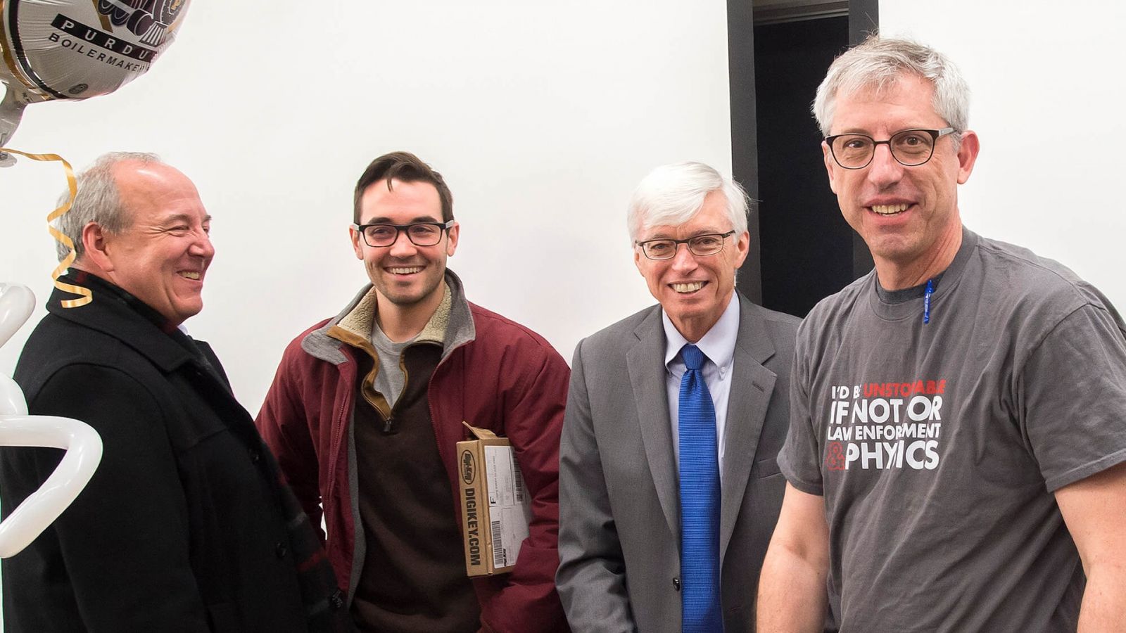 Patrick Connolly, associate dean and professor in Purdue Polytechnic Institute; Mitchell Gotsch, mechanical engineering technology student; Gary Bertoline, dean of Purdue Polytechnic Institute; and Mark French, professor of mechanical engineering technology. (Purdue University photo/Mark Simons)