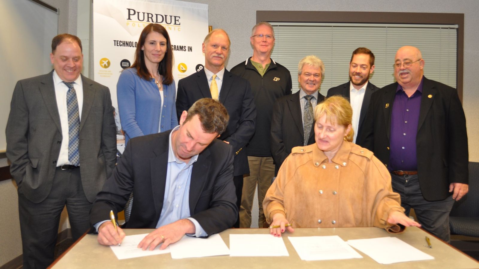 Standing, from left: David Hosick, public information officer; Erin Rowe, director of Response and Recovery; Jeff Groh, chief operating officer; Eric Dietz, director of the Purdue Homeland Security Institute and professor in the Department of Computer and Information Technology; Jim Greeson, State Fire Marshal; Jonathan Whitham, general counsel; Chuck Emsweller, chief information officer. Seated, from left: Bryan Langley, executive director of Indiana Department of Homeland Security; Geanie Umberger, associate dean for the Purdue Polytechnic Institute’s Office of Engagement