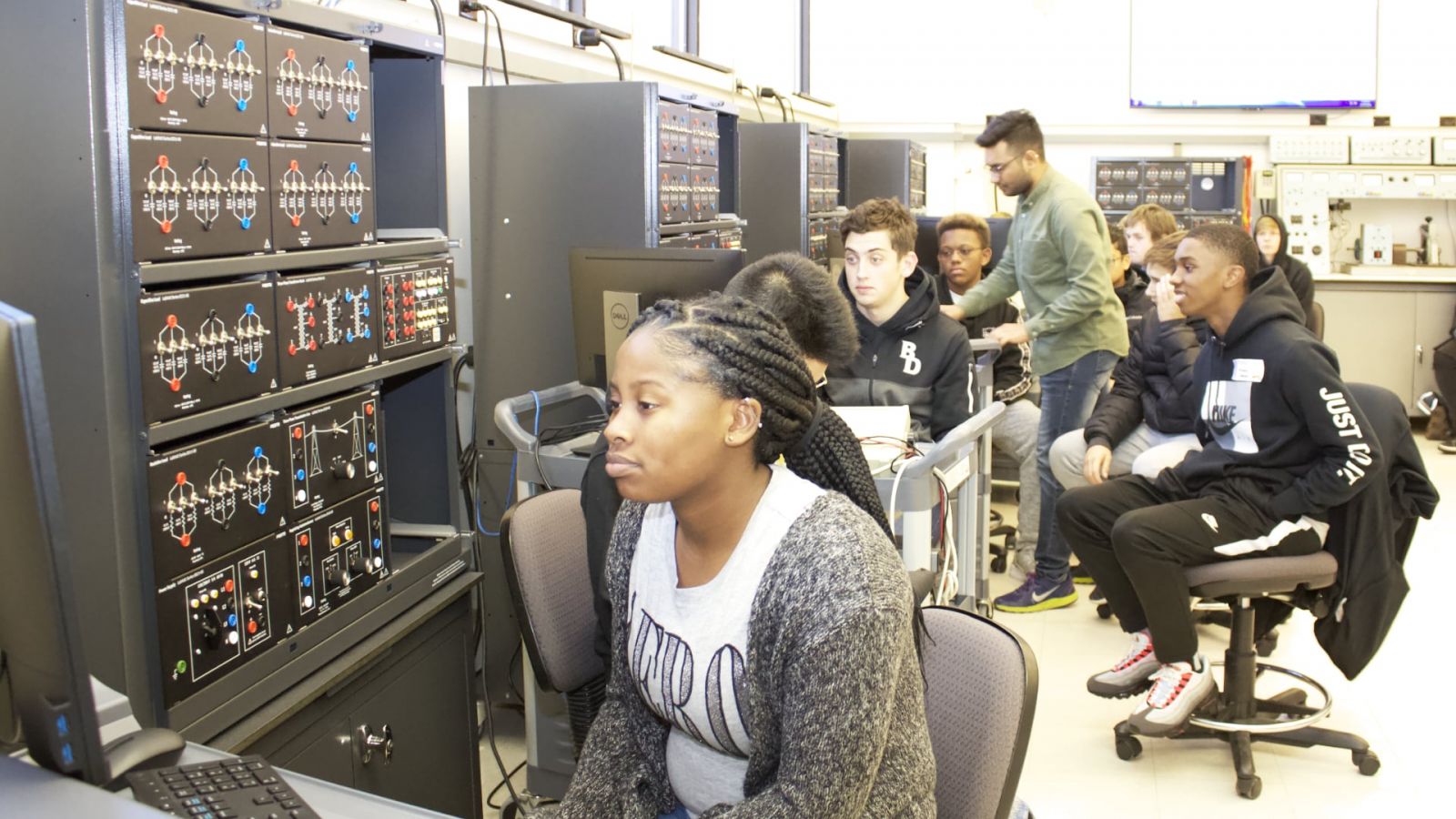 High school students learn about photovoltaic system design during CLAIMiT