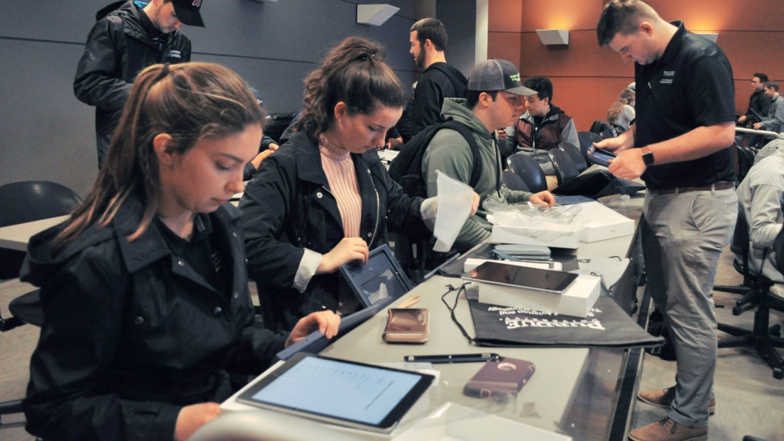 Aviation technology students learning about the components of their new Electronic Purdue Bag (EPB)