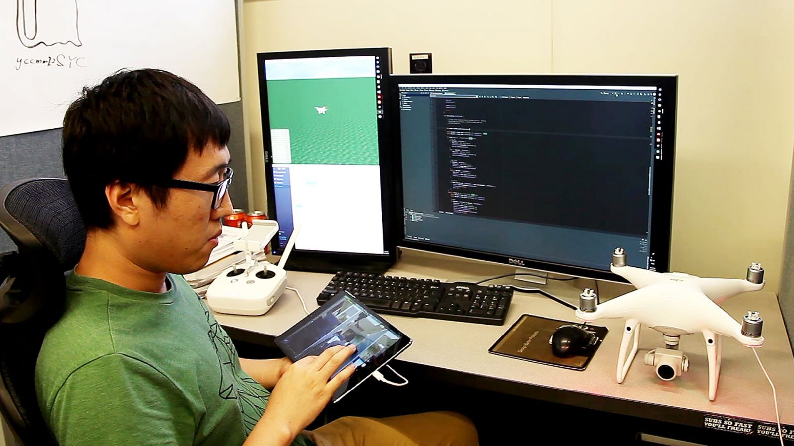 Hao Kang, doctoral student and co-investigator for FlyCam, works on the touch-screen navigation system. (Purdue University photo/High Performance Computer Graphics Lab)