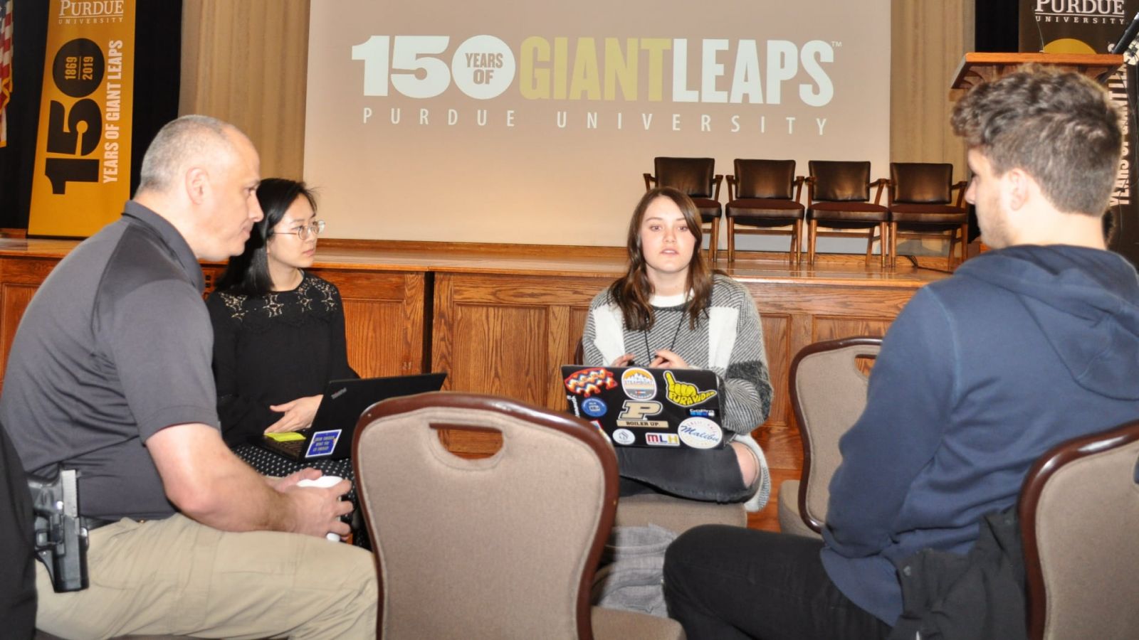This team of students and their mentor, a local law enforcement officer, began their brainstorming session in the Purdue Memorial Union ballroom immediately following the human trafficking event presentations.
