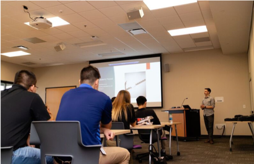 Intern Kai Hardy Mangiaracina, a rising sophomore at Purdue University studying computer graphics and design engineering, presents to fellow participating interns on the Conexus Indiana INvets program he collaborated on with Conexus Indiana. 