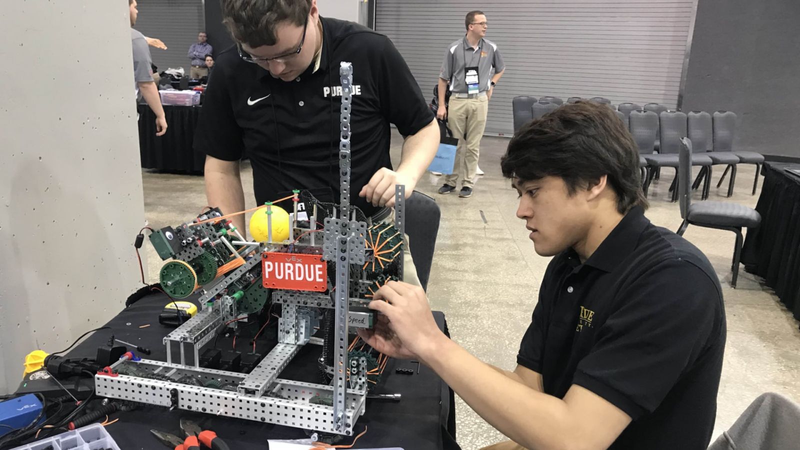 Purdue Polytechnic students Brian DeRome and Liam Rowe assemble the robotic entry at the 2019 ITEEA conference. The Purdue team took first place in the conference’s robotics competition.