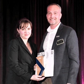 Mark Zimpfer (right) receives Outstanding Junior Faculty Award