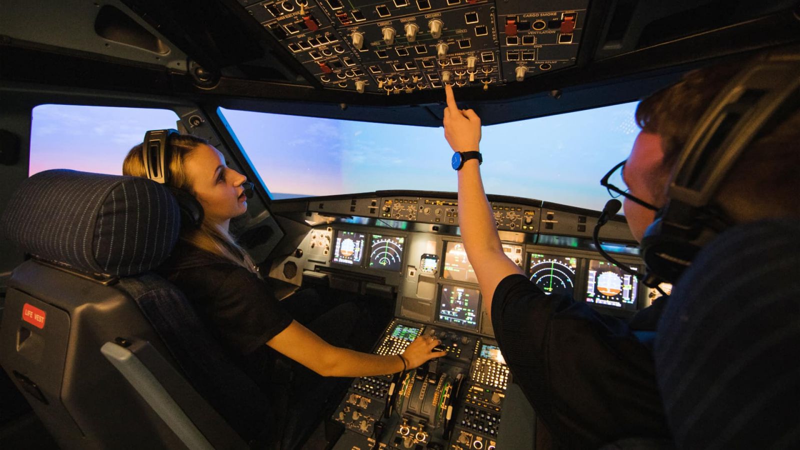 A student pilot and instructor on a flight in Purdue University's Airbus A320 simulator (Purdue University photo/Brian Powell)