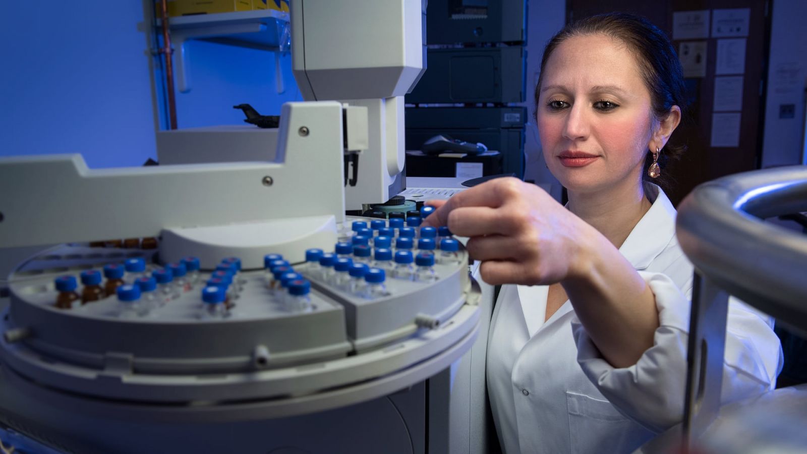 Gozdem Kilaz examines fuel samples from a two-dimensional gas chromatography in the Fuel Laboratory of Renewable Energy. (Purdue University photo/John Underwood)