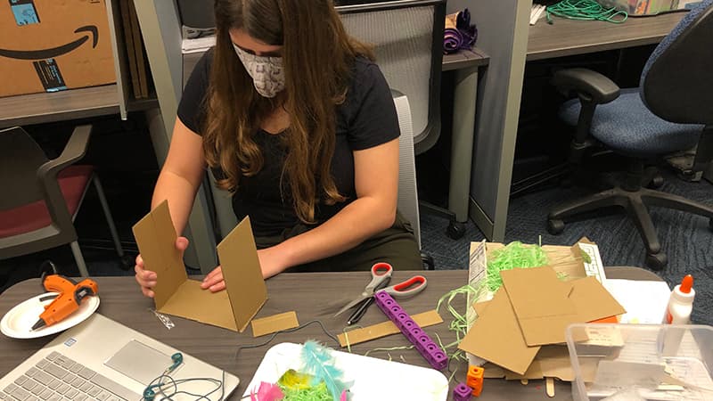 Elementary education major Rebecca Bryant works on a nest box as part of the Engineering by Design “Home Tweet Home” unit for young children. The program is designed to teach children science, technology, engineering and mathematics (STEM) more effectively by relating it to the world around them. (Photo provided)