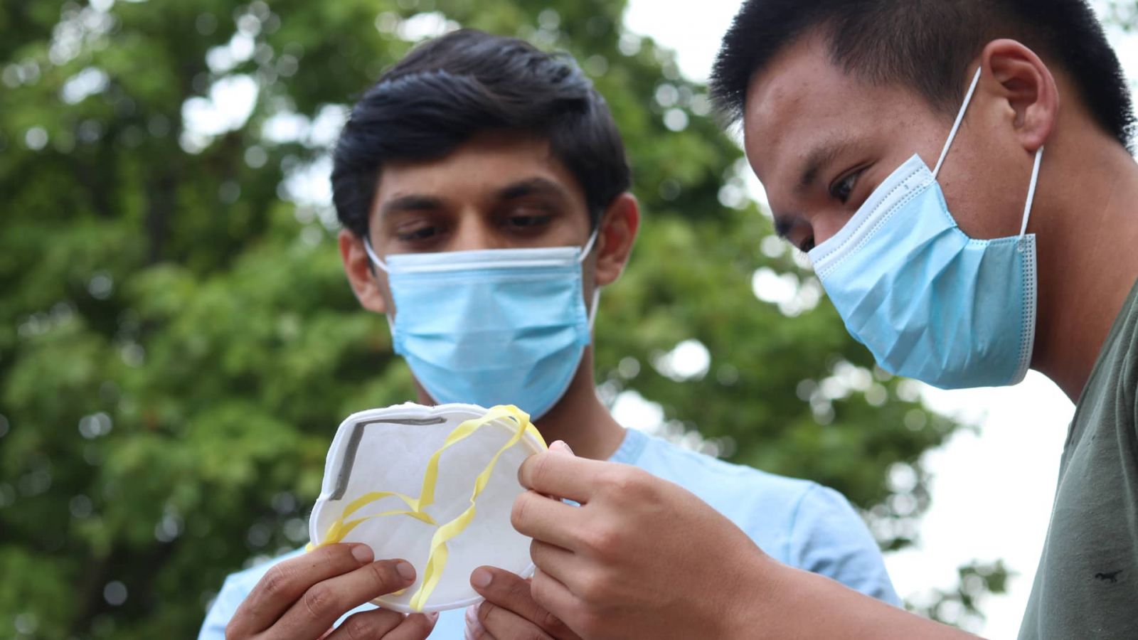 Hersh Rai and Nicholas Toan-Nang Vu discuss design improvements for traditional N95 masks.