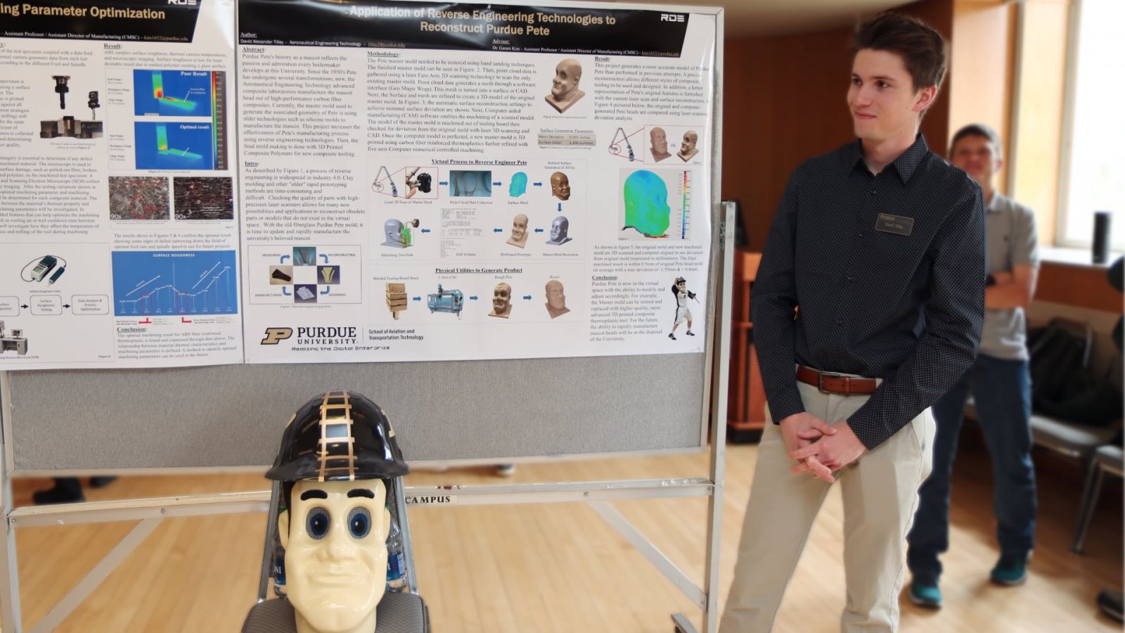 David Tilley, a research assistant studying aeronautical engineering technology, presents "“Application of Reverse Engineering Technologies to Reconstruct Purdue Pete” (Purdue University photo/John O'Malley)