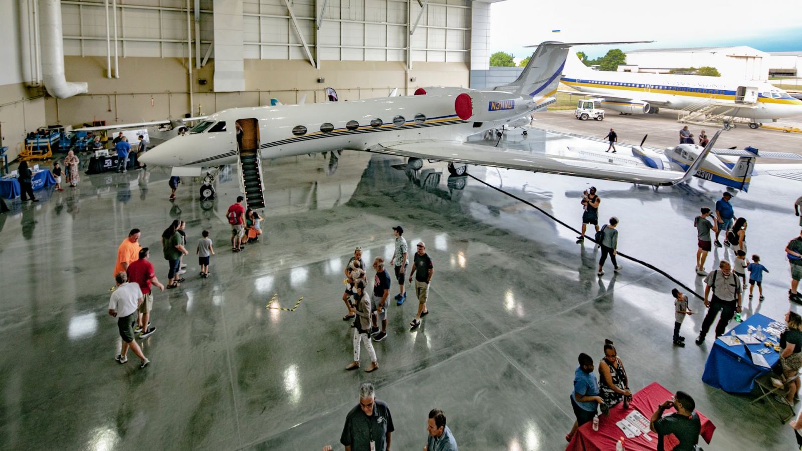 Visitors to a previous Aviation Community Day in Indianapolis toured jet aircraft on display.