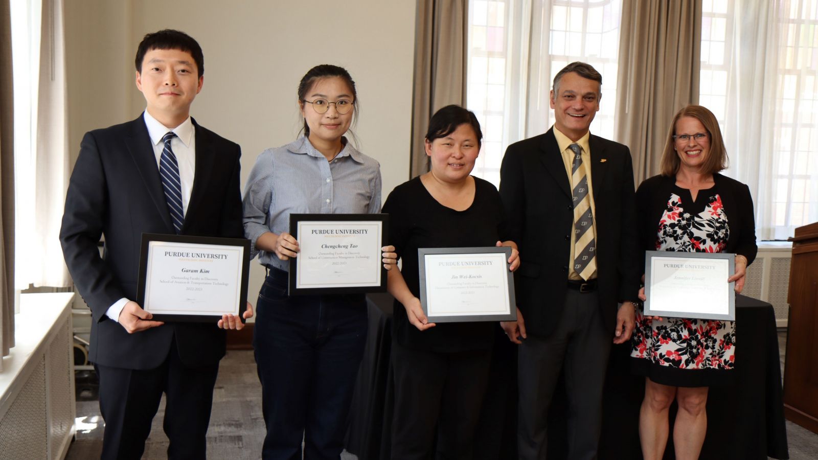 Outstanding Faculty in Discovery nominees (Garam Kim, Chengcheng Tao, Jin Wei-Kocsis and Jennifer Linvill) with Daniel Castro.  (Purdue University photo/John O'Malley)