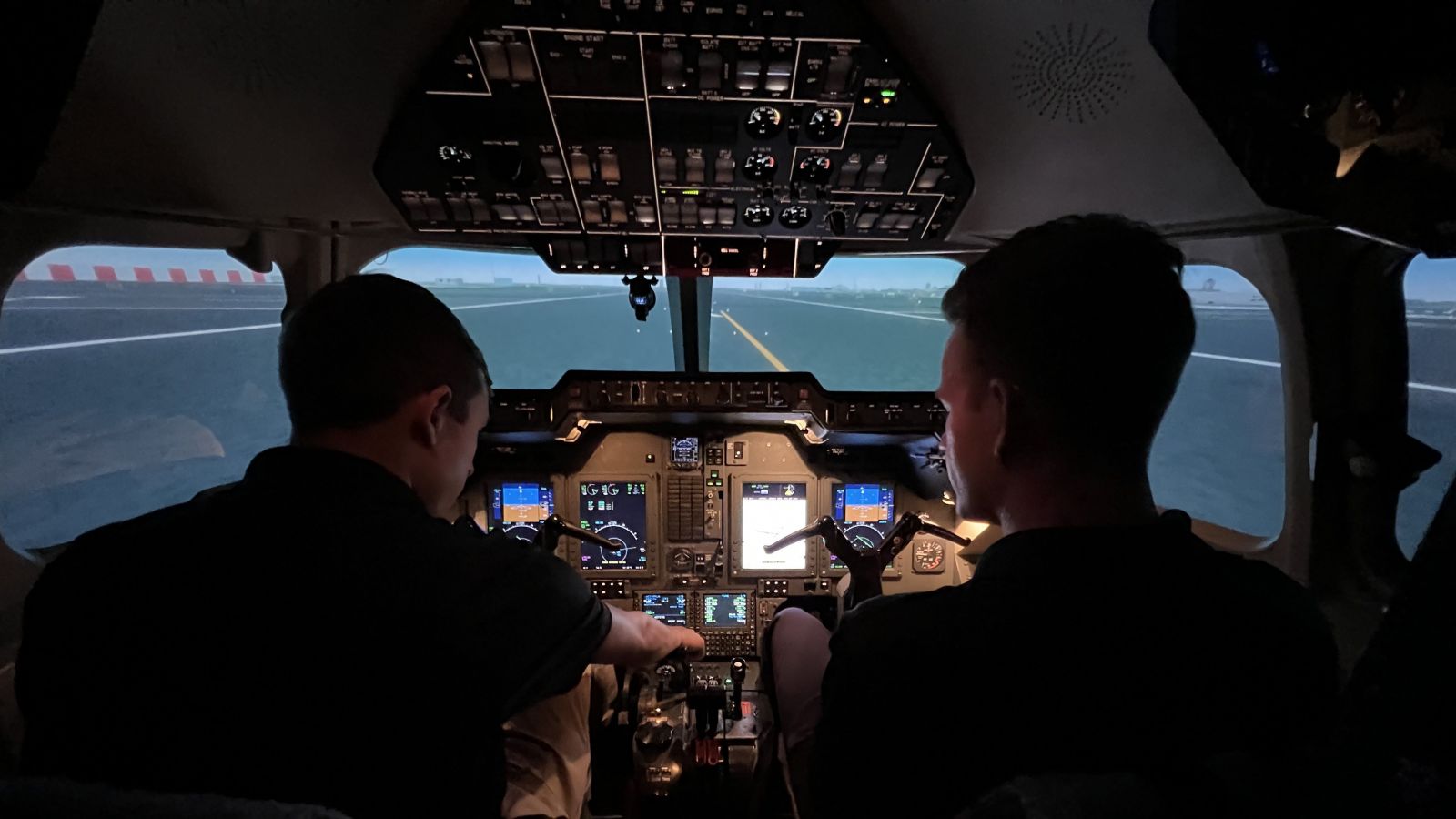 Purdue Polytechnic students proceed down the runway in the college's Hawker 900xp simulation. (Purdue University photo/John O'Malley)