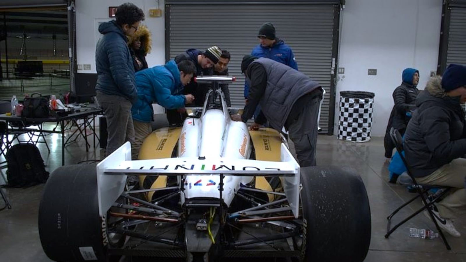 The Black and Gold AV Race Team works on the 2023 model of their driverless Indy NXT car. (Photo credit/Black and Gold AV Racing)