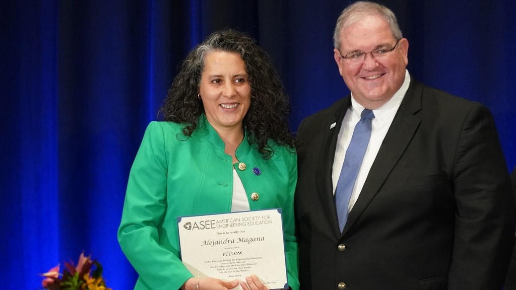 Alejandra Magana (left) is inducted at the ASEE Annual Conference by president Doug Tougaw. (Photo provided)
