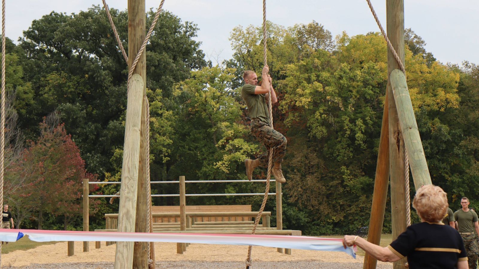 Naval ROTC midshipman Ryan Getler, training to become a Marine, completes a run on the newly-dedicated obstacle course during the September dedication. (Purdue University photo/Nick Pompella)