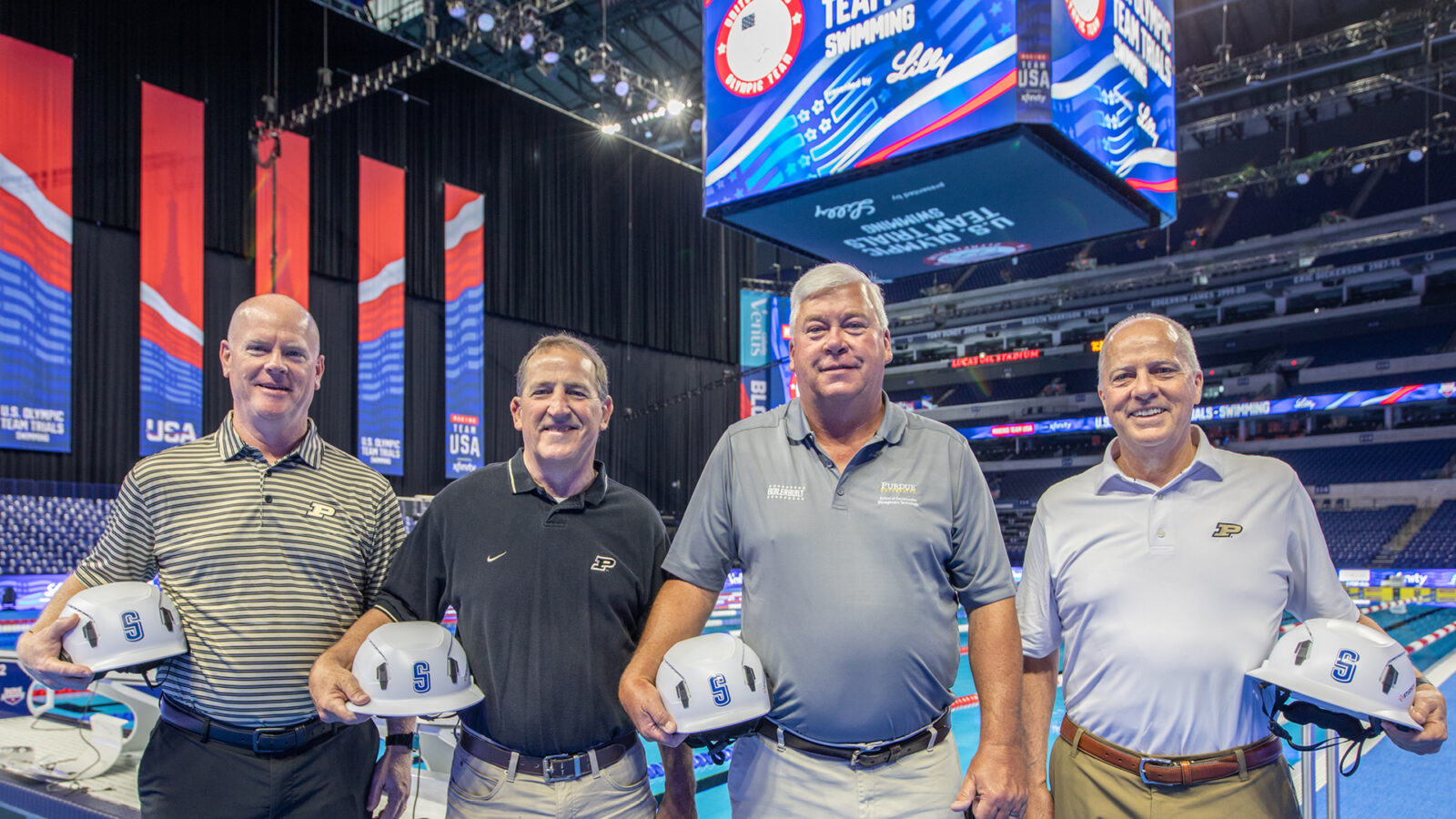 Boilermakers (from left to right) Nathan Moore, Dave Burchard, Tony Eisenhut and Mike Dilts are part of the Shiel Sexton team organizing the building of two Olympic swimming pools inside Lucas Oil Stadium. (Photo courtesy of Megan Ratts Photography, LLC)