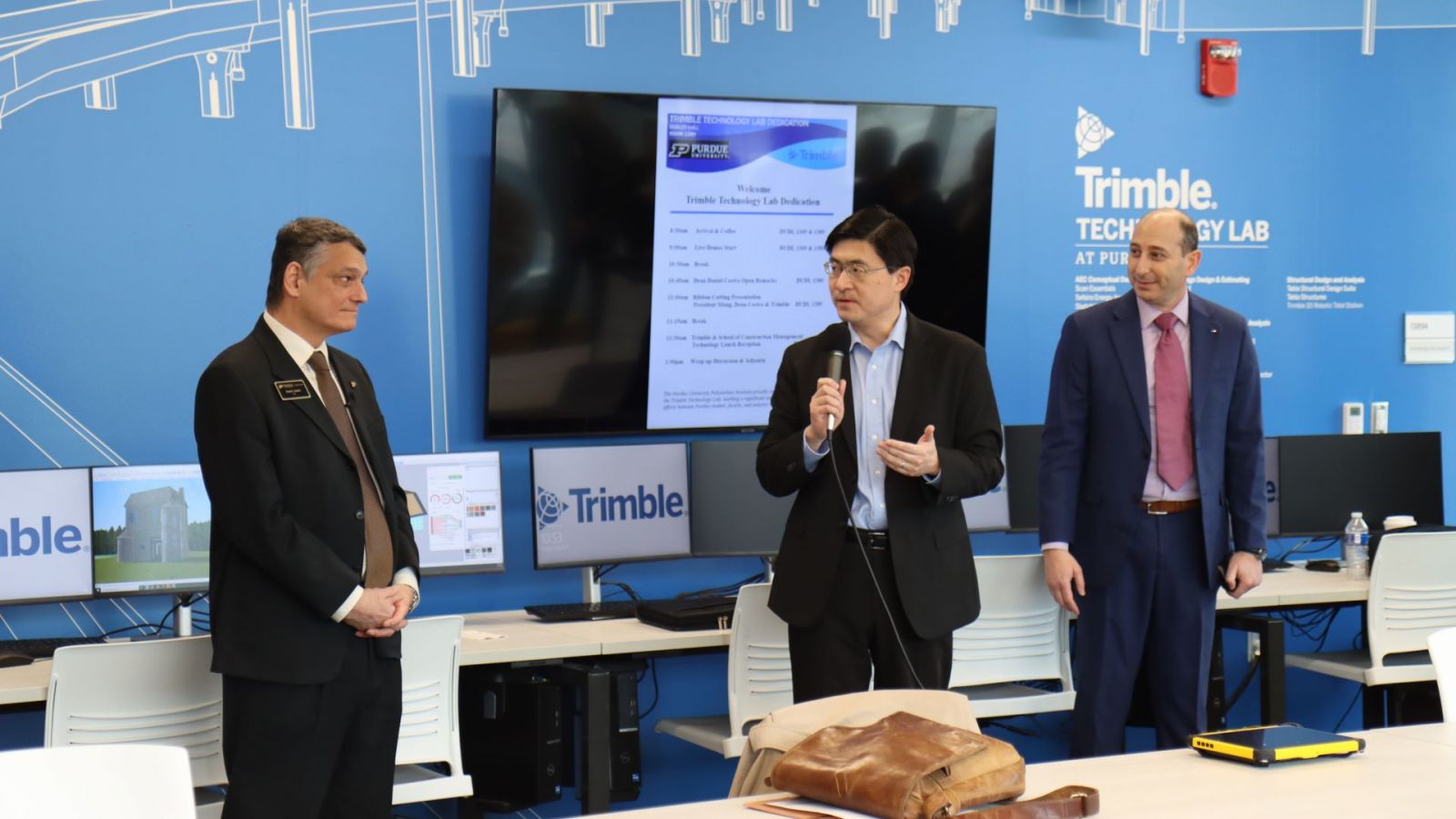 Dean Castro (left), Chiang and Dib speak at the Trimble Technology Lab inauguration. (Purdue University photo/Zach Rodimel)