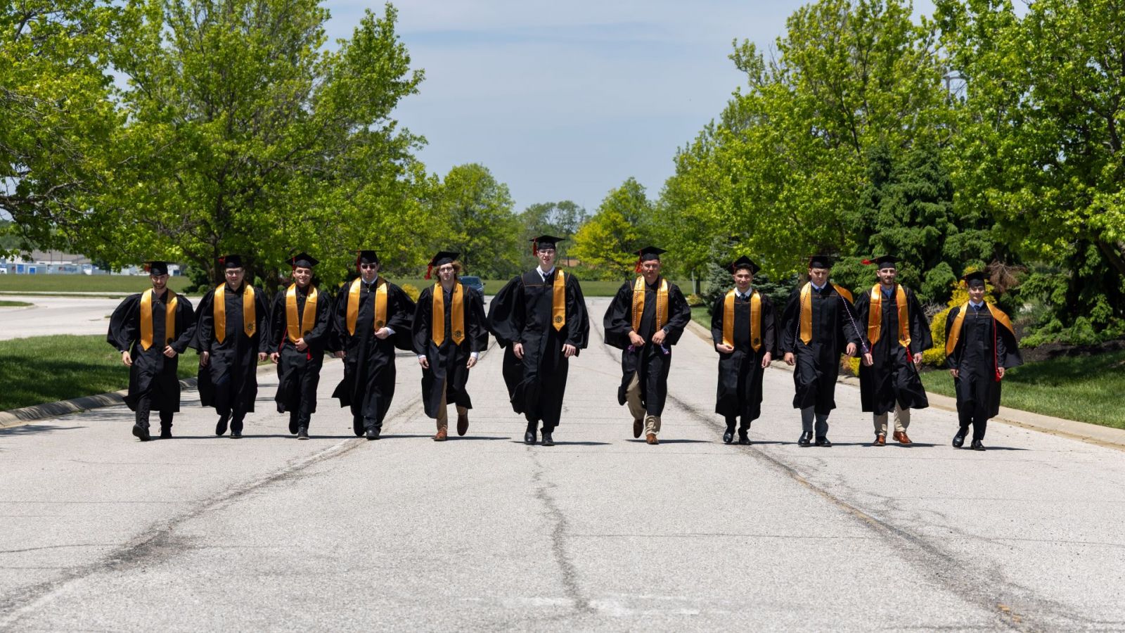 All graduates from the 2025 spring commencement at Indianapolis' Aviation Technology Center. (Photo credit: Black Rocket Photography)