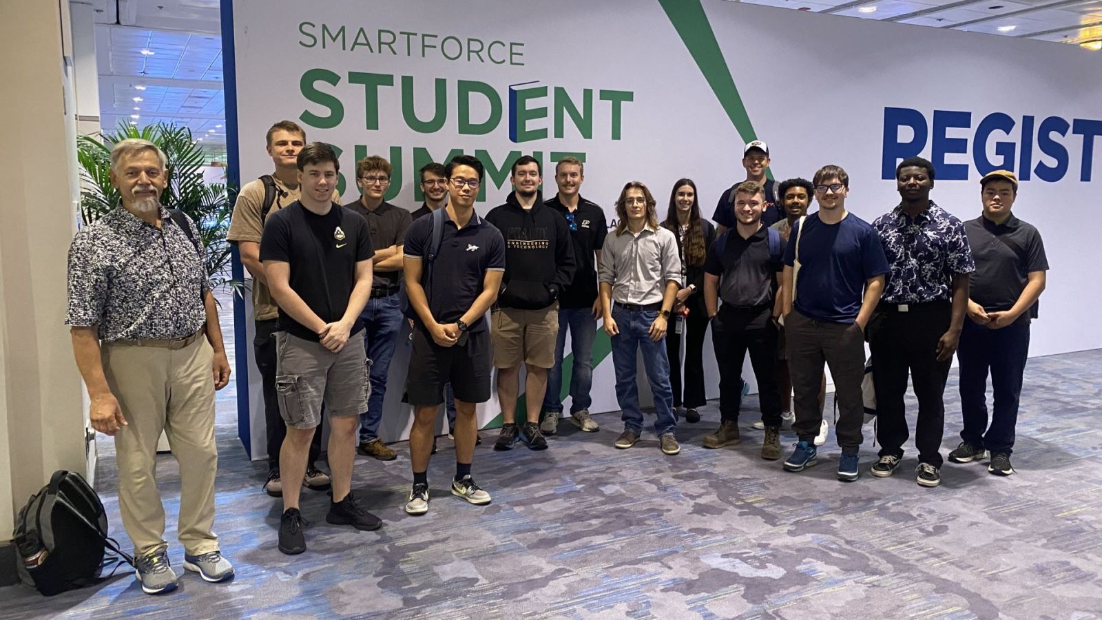 Valeriy Yasinskiy (left) and students from Purdue students in Indianapolis at the 2024 Chicago IMTS exhibition. (Photo provided)