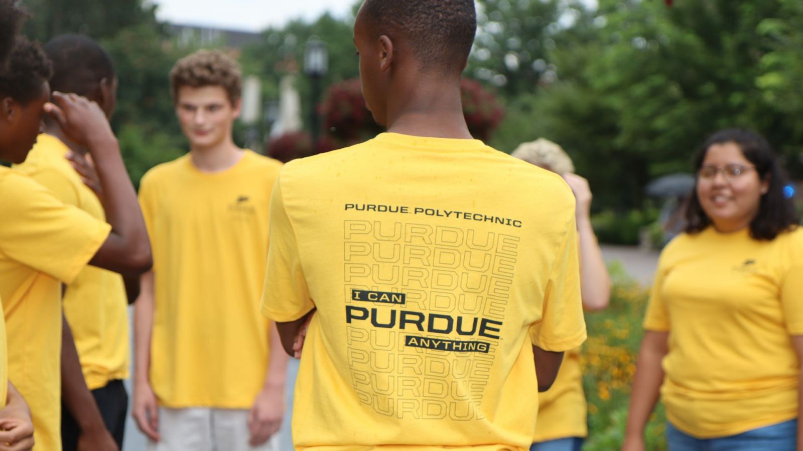 Incoming Purdue Polytechnic students gathered near the bell tower at the start of a new semester. (Purdue University photo/John O'Malley)