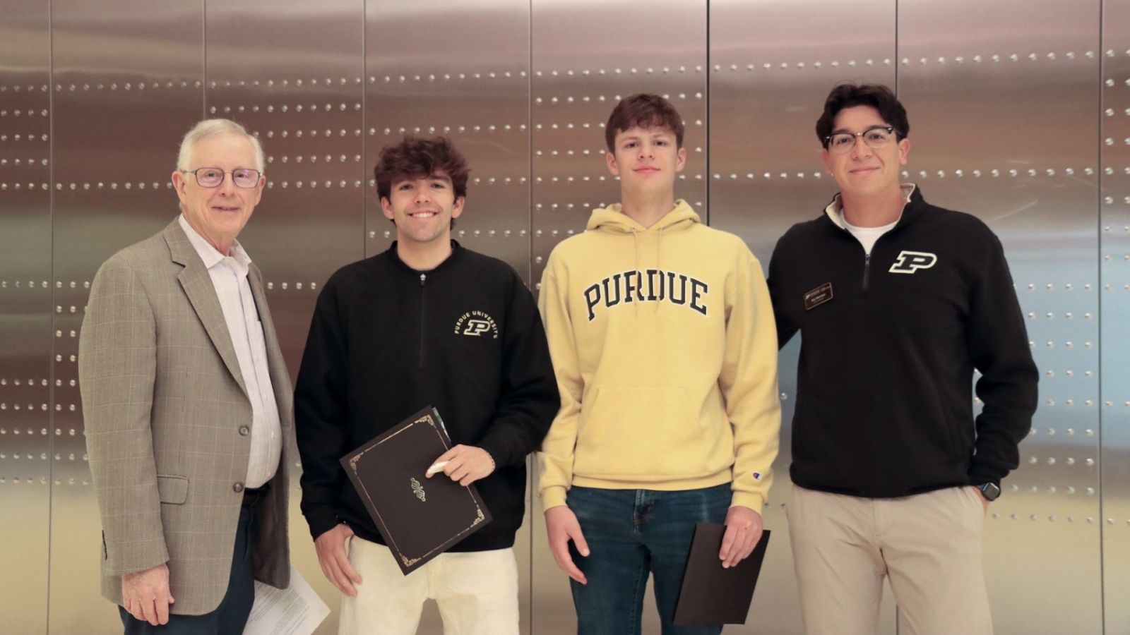 SoET's top three competitors with school head Ken Burbank. (Photo provided)