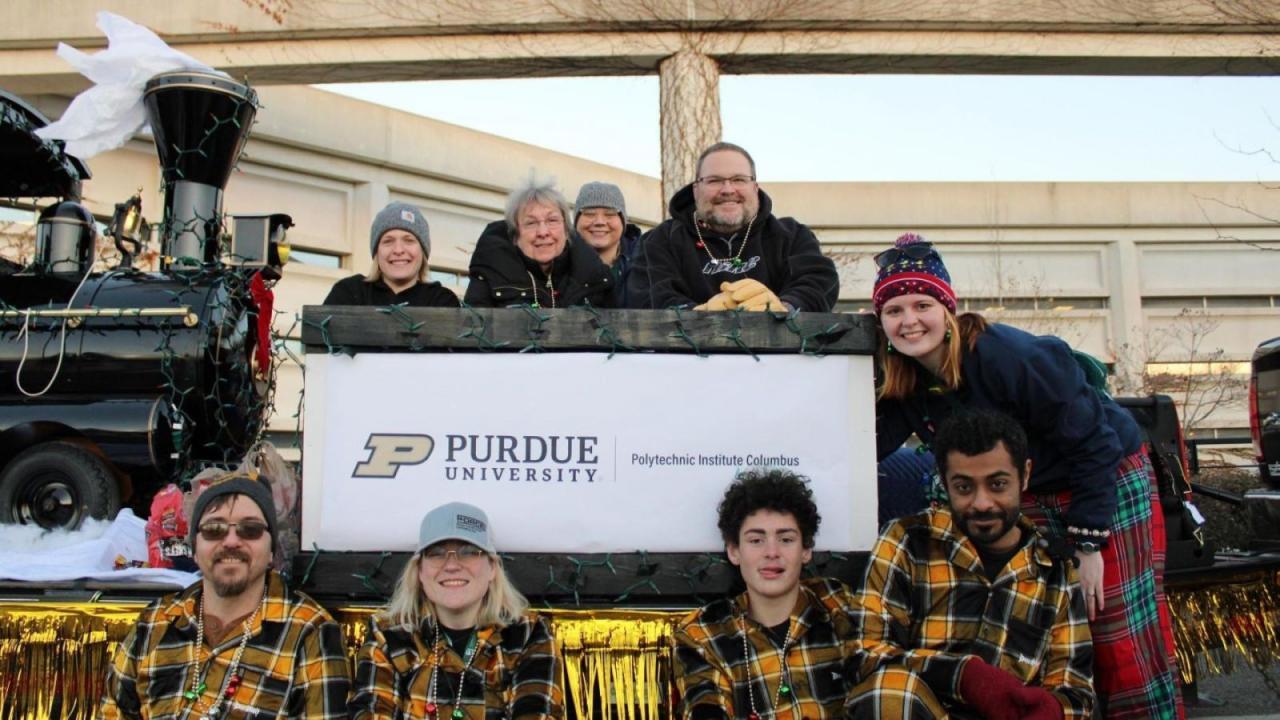 Purdue Polytechnic in Columbus faculty, staff, and students collectively turn out for events in the community, such as winter-season parades. (Purdue University photo)
