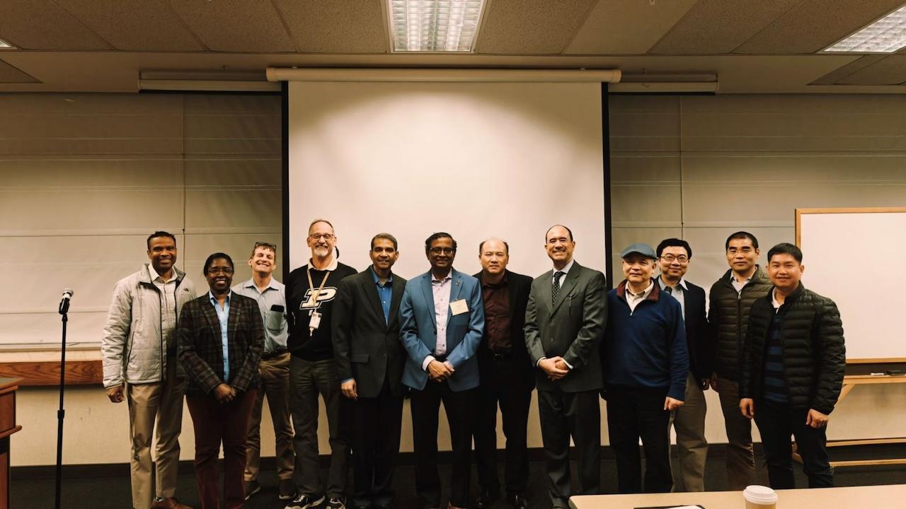 Sudarsan Rachuri (center) with collected Purdue Polytechnic faculty at the Dean's Lecture Series. (Photo credit/Justin Yang)