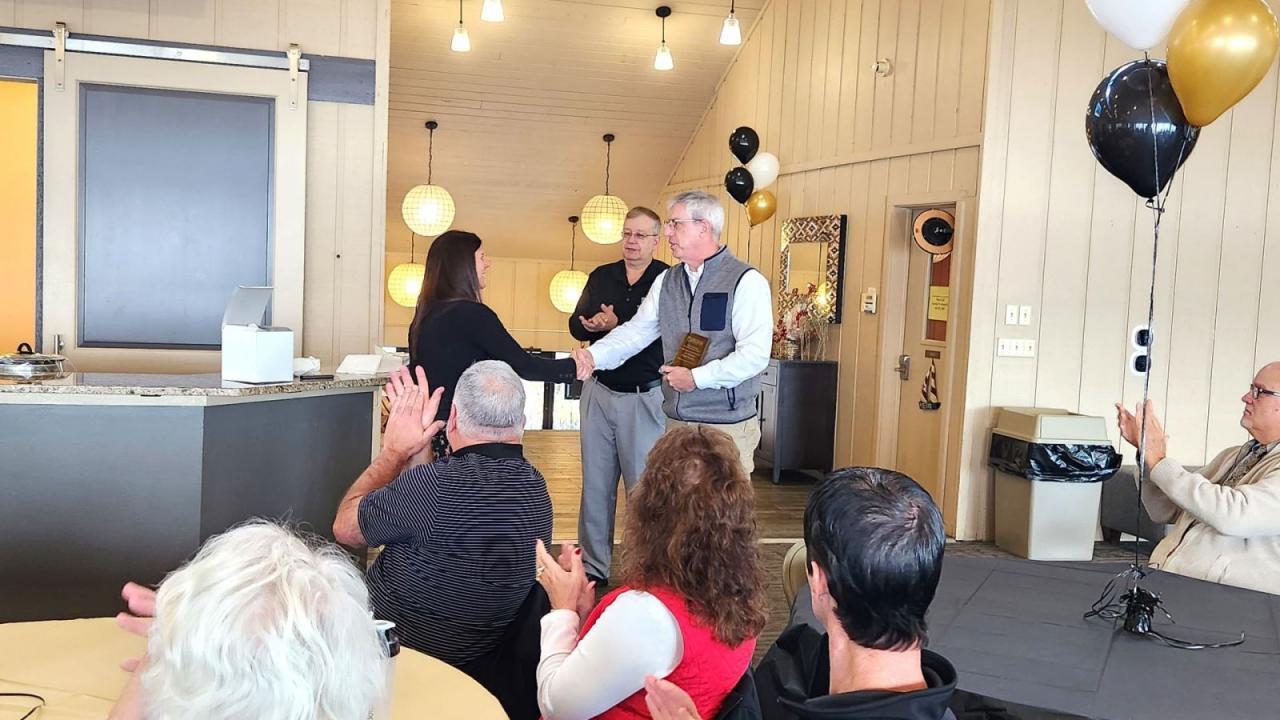 Mark French (right) receives a Lifetime Achievement Award at the Purdue Manufacturing Extension Partnership in Carmel, Indiana. (Photo provided)
