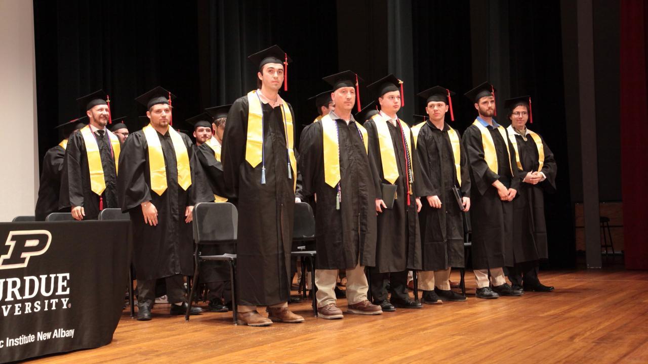 The graduating class (pictured) received degrees in fields including computer graphics technology, electrical engineering technology, and mechanical engineering technology.