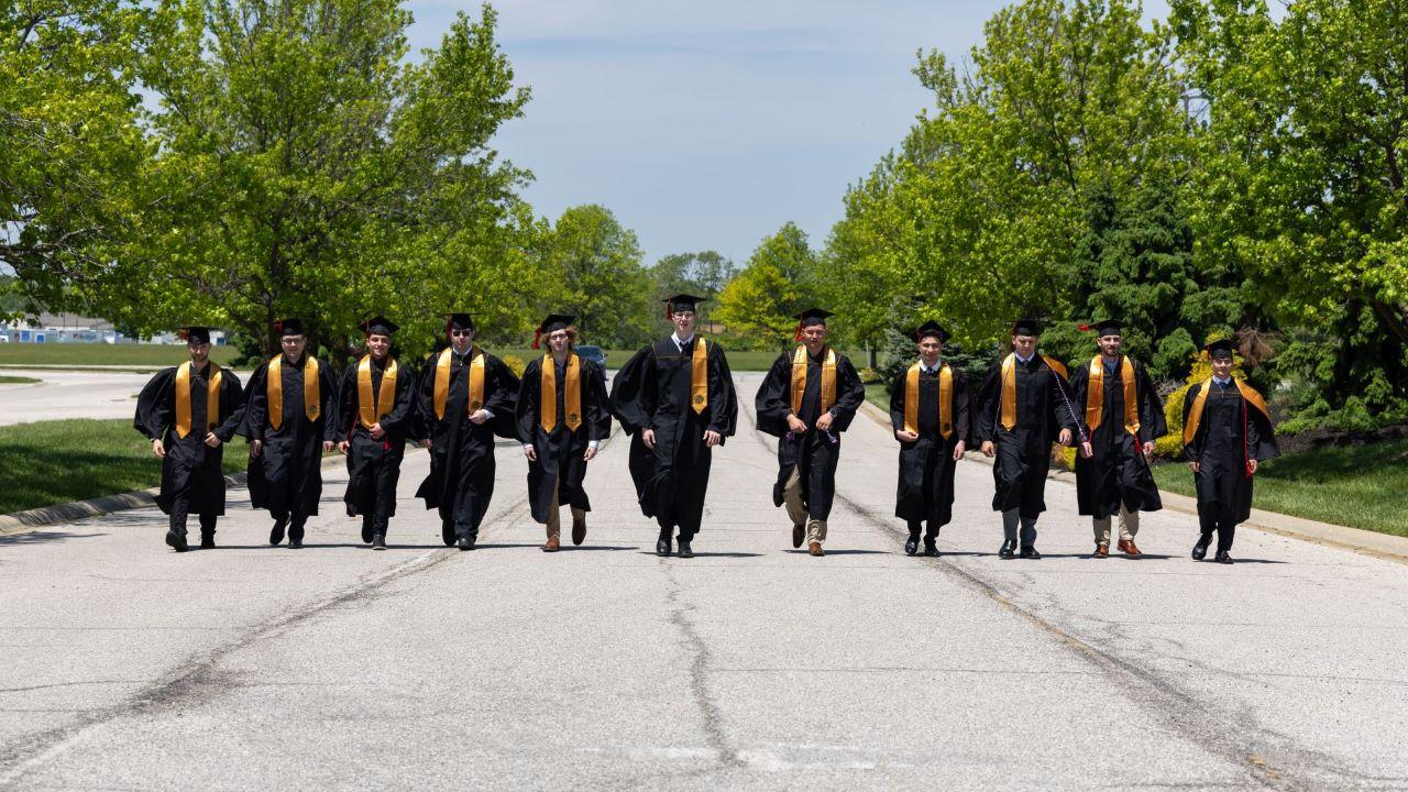 All graduates from the 2025 spring commencement at Indianapolis' Aviation Technology Center. (Photo credit: Black Rocket Photography)